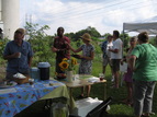 Picture of gardeners and visitors socializing